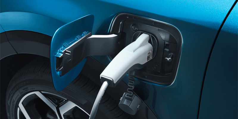 A 2025 Kia Niro Plug-in Hybrid charging in Alliance, OH